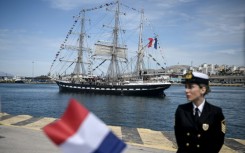 The Olympic torch begins its sea journey to France on the Belem from Piraeus