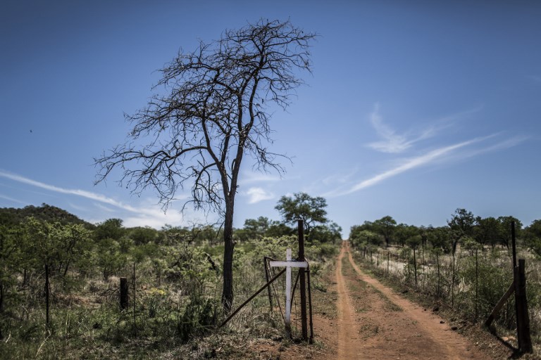 Trump And Land Fears Boost South Africa S White Right Enca - a cross mounted on a fence marks the road to the white cross monument where