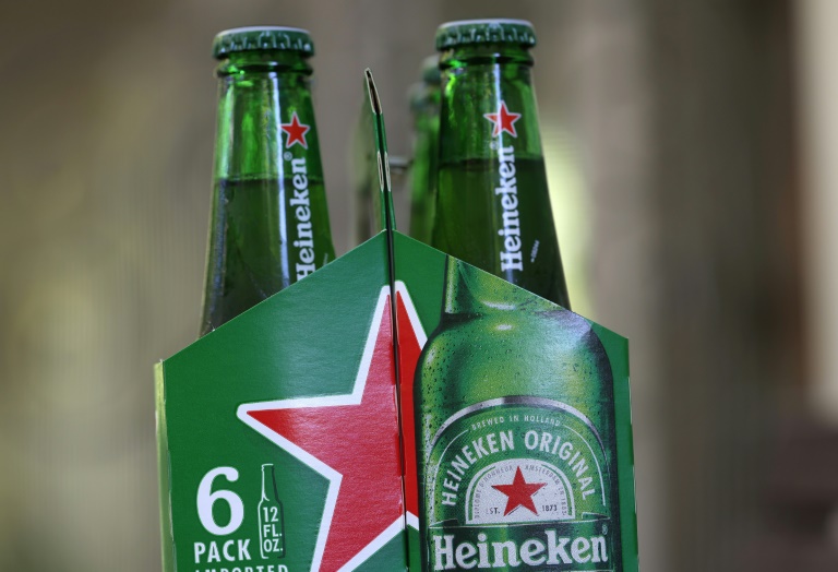 Dutch brewer Heineken sells its Russian operations for 1 euro, taking a  300-million-euro hit