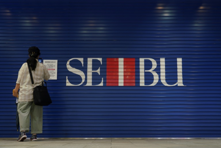 Workers stage Japan's first strike in decades over department store sale