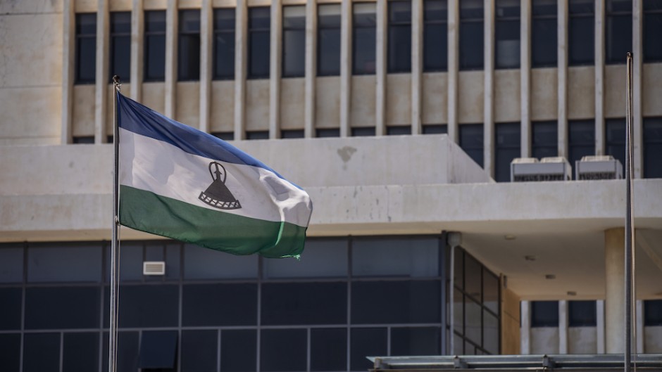 A picture taken in Maseru, on January 31, 2020 shows the flag of Lesotho outside the Parliament building.