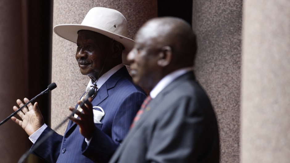 File: Ugandan President Yoweri Museveni (L) speaks during a press conference after a meeting with South African President Cyril Ramaphosa (R) at the Union Buildings in Pretoria on February 28, 2023. GUILLEM SARTORIO / AFP