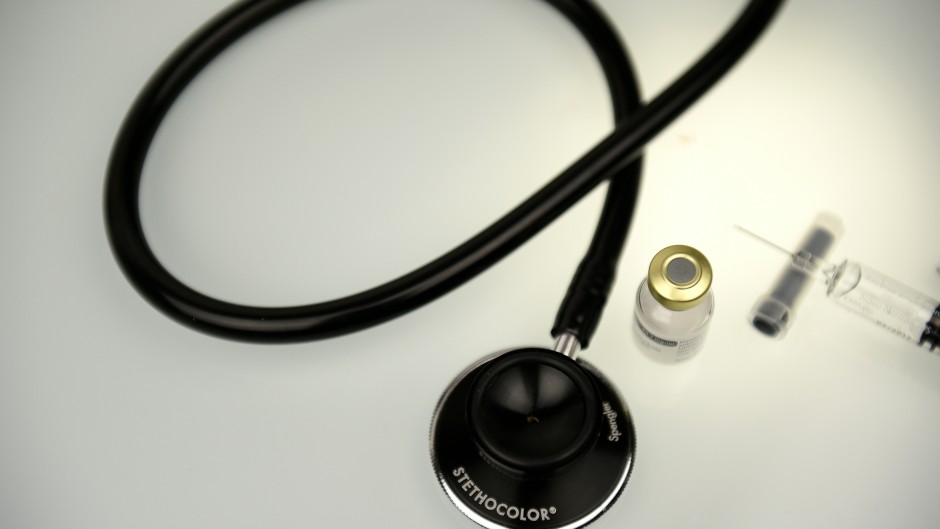 File: A picture taken on March 14, 2016 shows a solution for the treatment of severe hypoglycemia that may occur in diabetes and a stethoscope displayed on a desktop for an illustration in Paris.