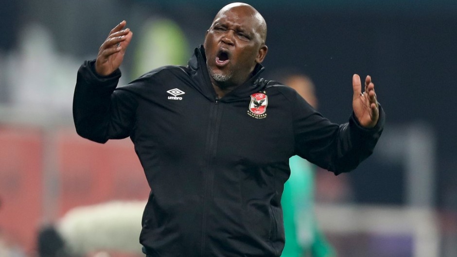 Pitso Mosimane reacts during the FIFA Club World Cup second round football match between Qatar's Duhail and Egypt's Al-Ahly at the Education City Stadium in the Qatari city of Ar-Rayyan on February 4, 2021.