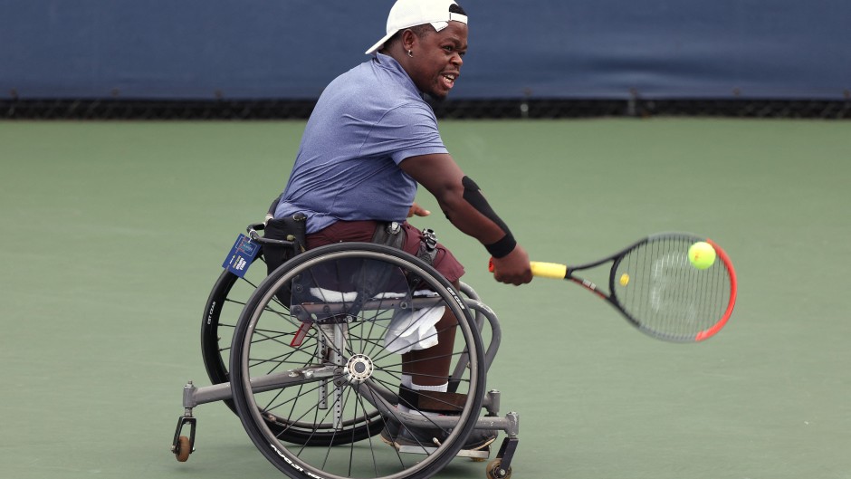 Donald Ramphadi strides to a tennis court baking in Pretoria heat, as he gets ready for a practice session on the Tuks High Performance Centre court.