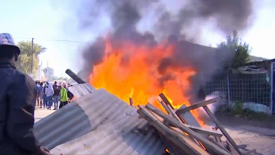 Diepsloot residents say they will continue to protest until President Cyril Ramaphosa comes to address them. Violence flared up in the area when residents took to the streets to protest the crime levels. (eNCA\screenshot)