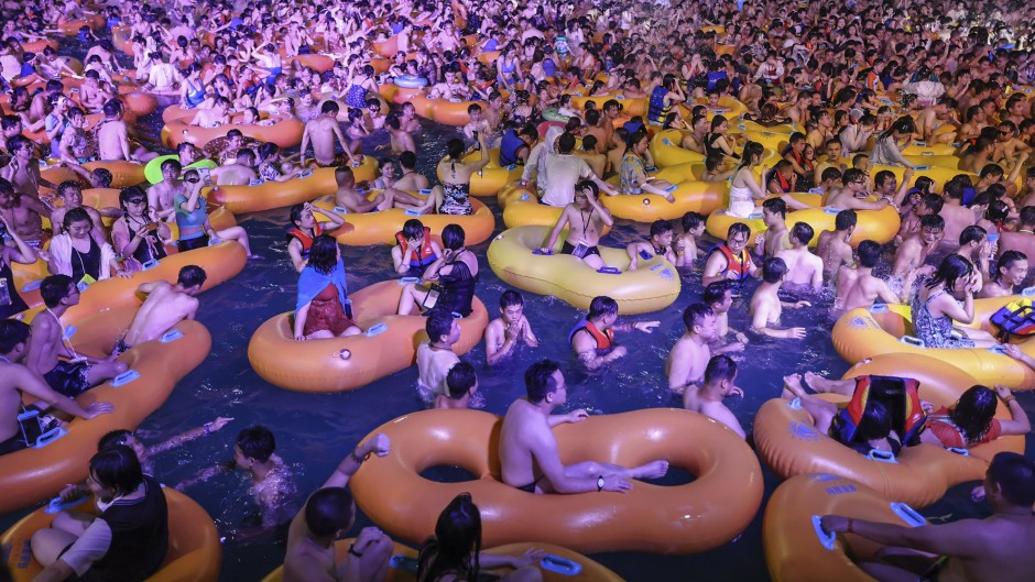 The popular Wuhan Maya Beach Water Park was filled with people frolicking in swimsuits and goggles for an electronic music festival.