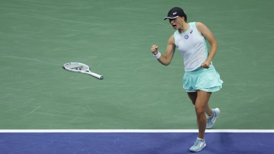 Iga Swiatek celebrates reaching the US Open final with victory over Aryna Sabalenka in the semi-finals