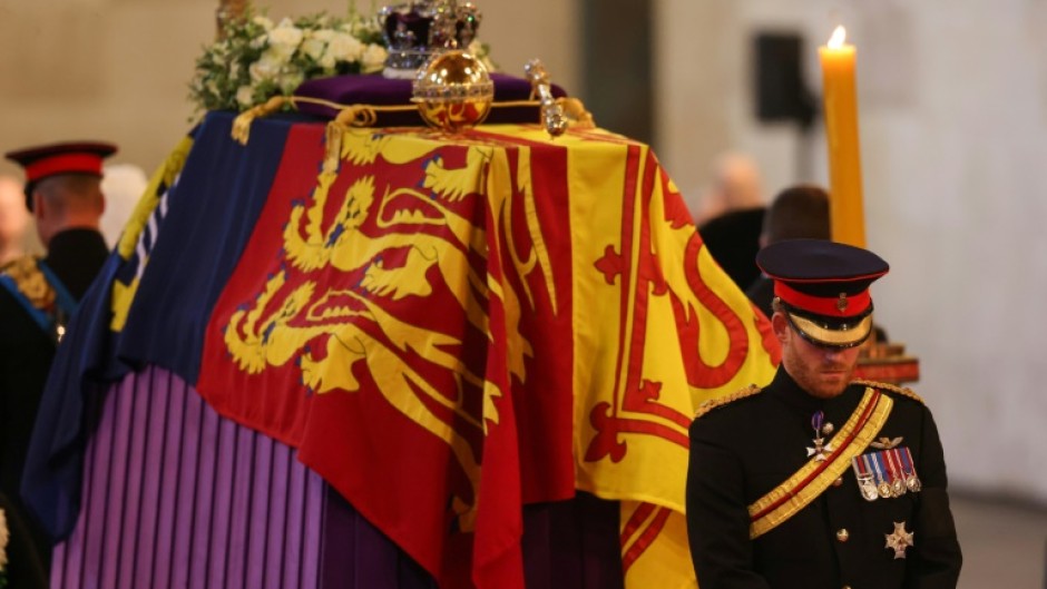 Queen Elizabeth II's grandchildren mounted the vigil around her coffin, with Prince Harry wearing his military uniform