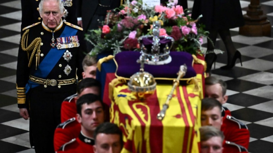 The king's message on the floral tribute to his mother read: 'In loving and devoted memory. Charles R.'