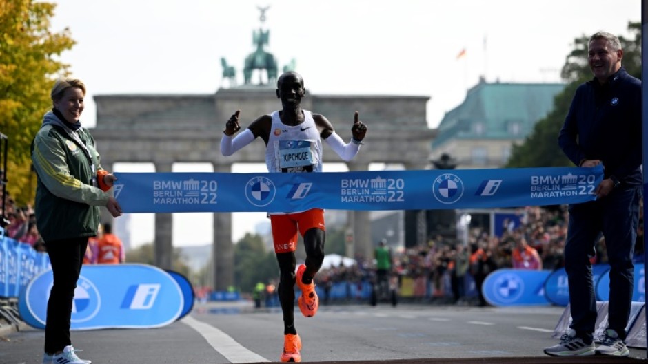 Kenya's Eliud Kipchoge crossing the line with a new world marathon record 