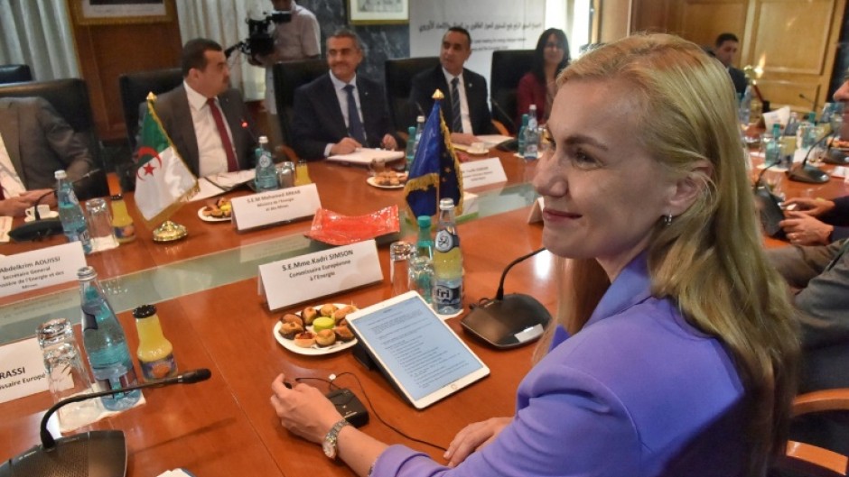 European Union's energy commissioner Kadri Simson (R) and members of her delegation attend a meeting with Algeria's Minister of Energy and Mines Mohamed Arkab