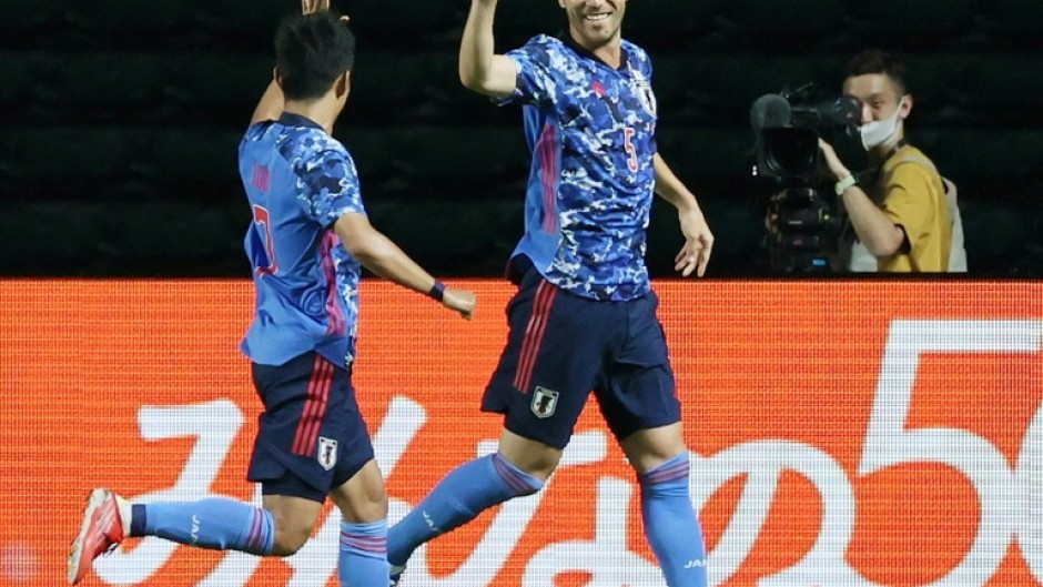 Japan captain Maya Yoshida (right) is hoping to lead his team into the World Cup quarter-finals for the first time in Qatar