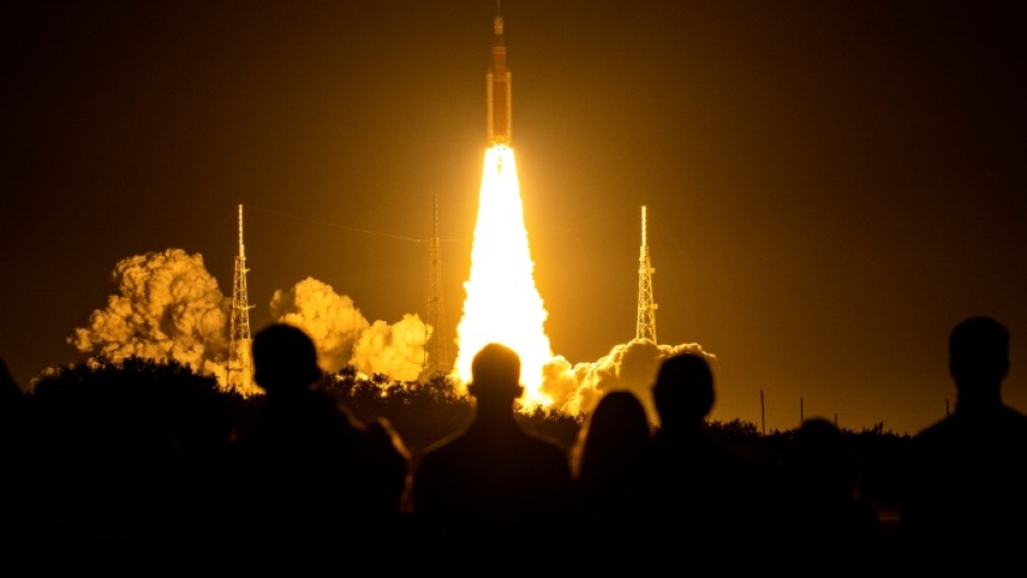 NASA's Artemis 1 unmanned lunar rocket lifts off from Kennedy Space Center at the start of its 25-day lunar mission