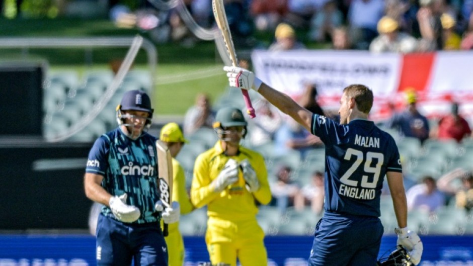 England's Dawid Malan celebrates reaching his century against Australia in Adelaide 