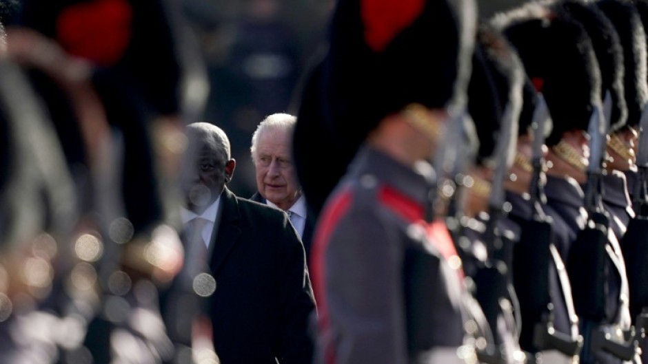 Ramaphosa and Charles inspect a Guard of Honour