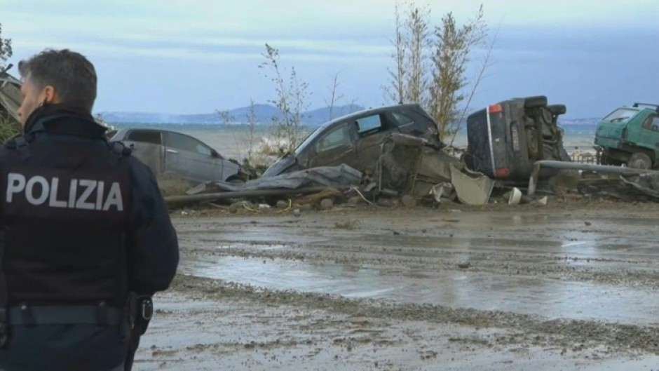 Damaged cars scattered along Ischia's seafront after landslide