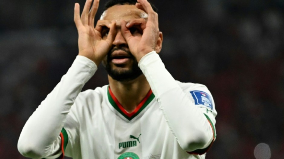 Youssef En-Nesyri celebrates scoring Morocco's second goal in the World Cup win against Canada that secured top spot in Group F