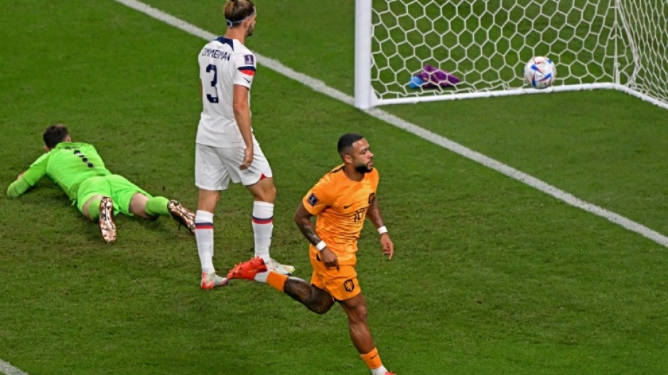 Memphis Depay celebrates after firing the Netherlands into the lead in their World Cup last 16 victory over the United States