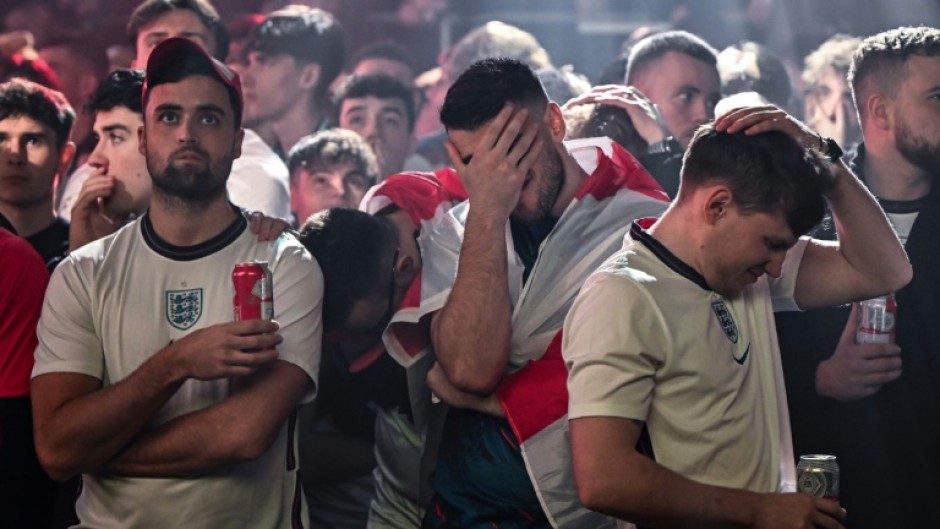 England fans in Manchester are despondent after France open the scoring in the World Cup quarter-final