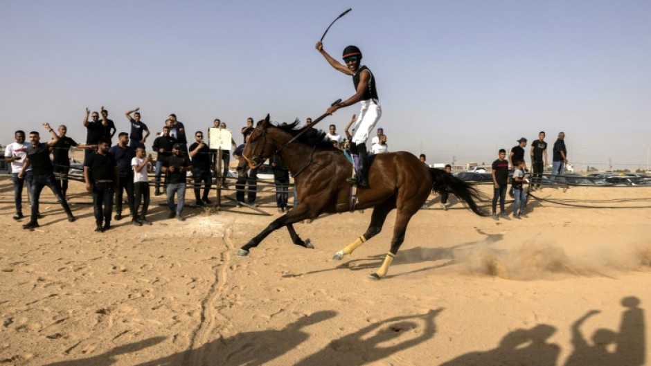 One horse trainer said the races offer an opportunity to foster closer ties between Israel's Arab and Jewish communities