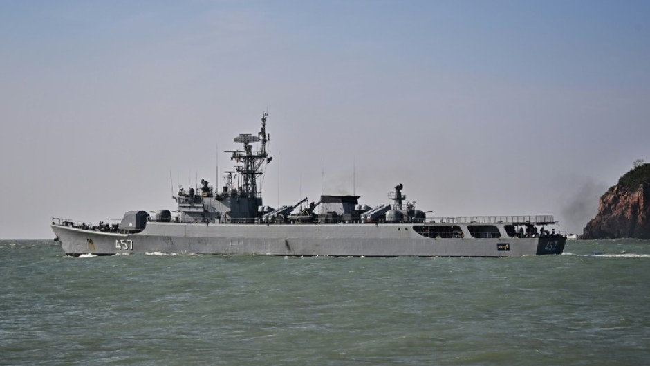 The HTMS Kraburi sails out from Prachuap Khiri Khan on Tuesday to resume the search for survivors after the sinking of Thai naval vessel HTMS Sukhothai 