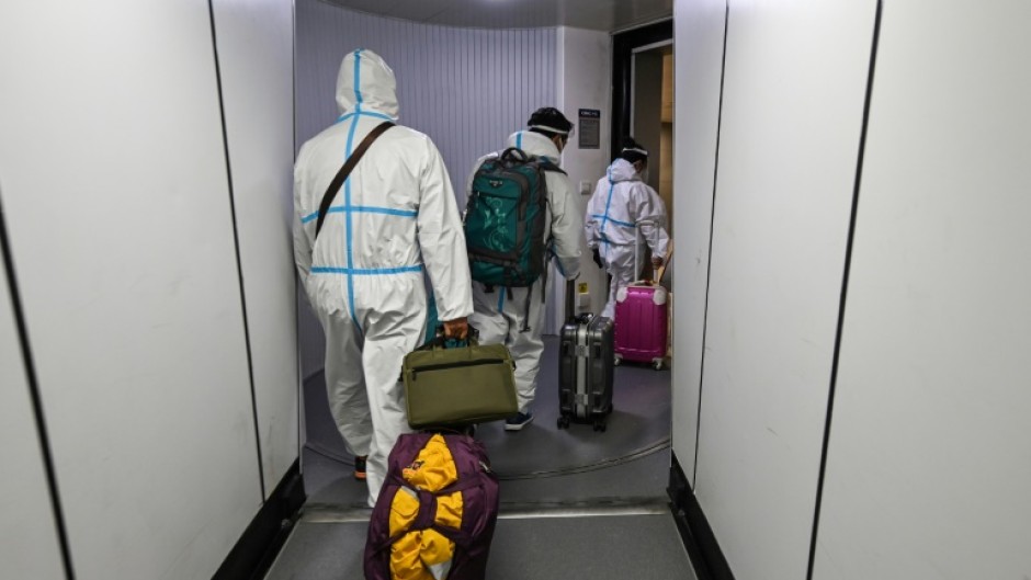 China will scrap quarantine on arrival in January