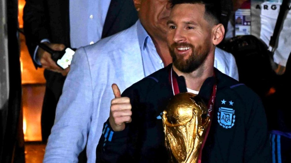 Lionel Messi (C) has been in Argentina since winning the World Cup