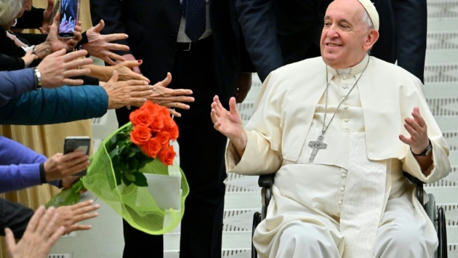 Pope Francis, who uses a wheelchair, went to be at the side of former pope Benedict 