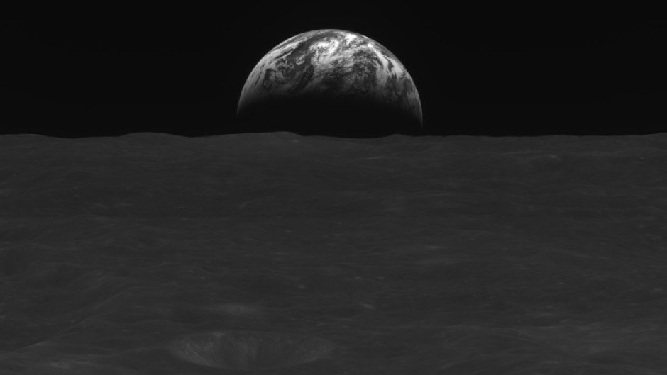 South Korea's first-ever lunar orbiter Danuri has sent black-and-white images of Earth and the lunar surface, including this photo taken on December 31, 2022