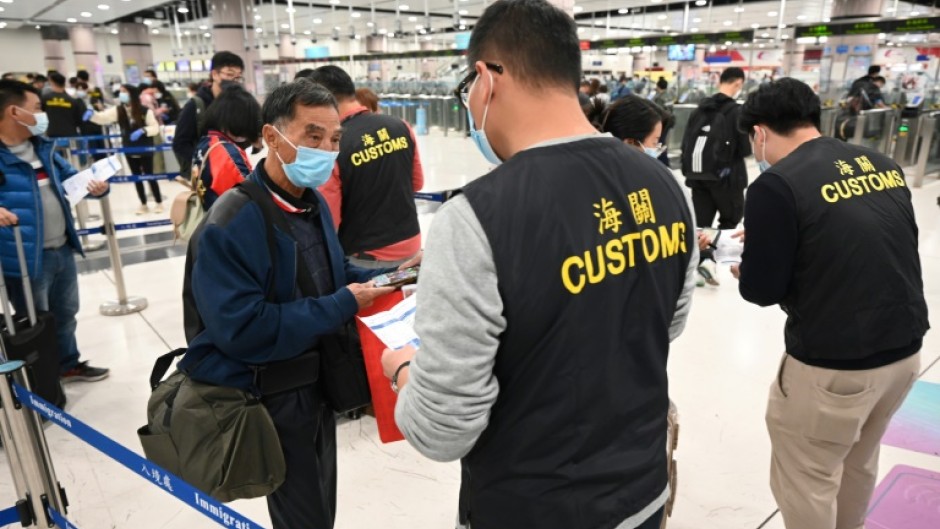 Up to 50,000 Hong Kong residents are now able to cross the border daily at three land checkpoints after registering online