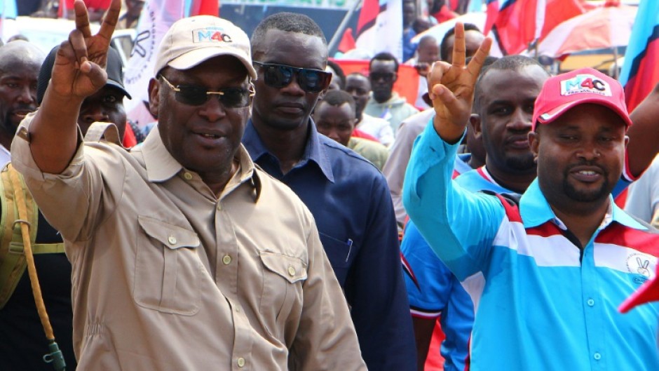 Freeman Mbowe, left, the Chadema chairman, during the party's rally in Mwanza