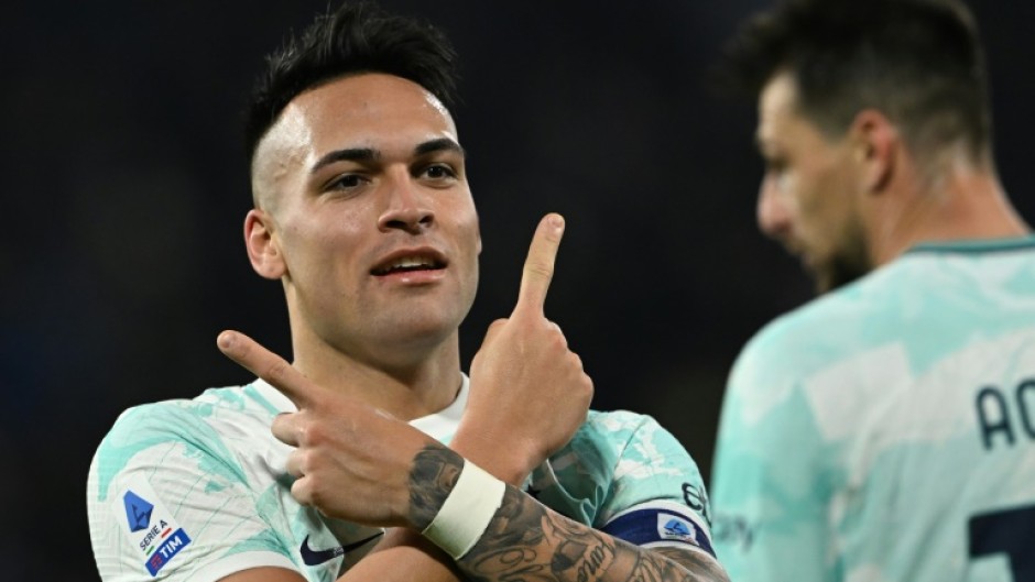 Fighting back: Inter Milan's Lautaro Martinez celebrates his two goals which took his league tally for the season to 11