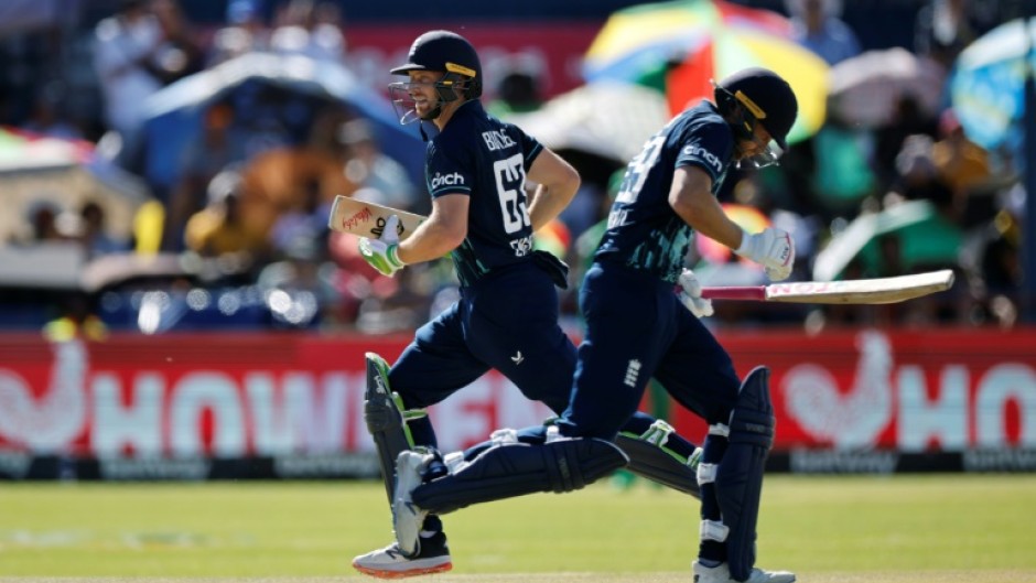 England captain Jos Buttler (L) and Dawid Malan (R) both made centuries and added 232 together in the third ODI against South Africa in Kimberley