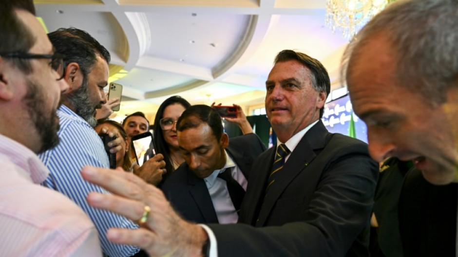 'I've always been a huge admirer of the American people,' Jair Bolsonaro tells a rally in Florida