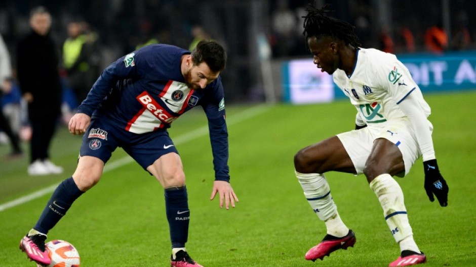 Lionel Messi (L) in action for PSG against Marseille in the French Cup on Wednesday