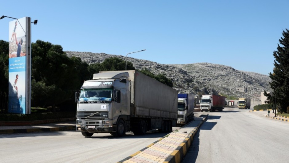 A United Nations aid convoy enters rebel-held northwestern Syria from Turkey through the Bab el-Hawa crossing