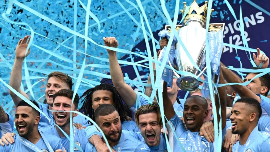 Manchester City lift the Premier League trophy