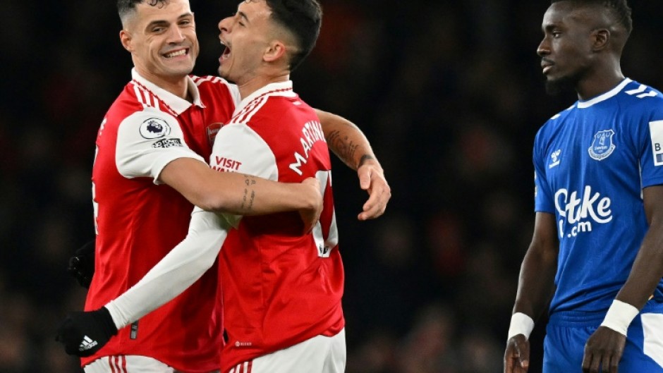 Arsenal's Gabriel Martinelli (C) celebrates scoring against Everton