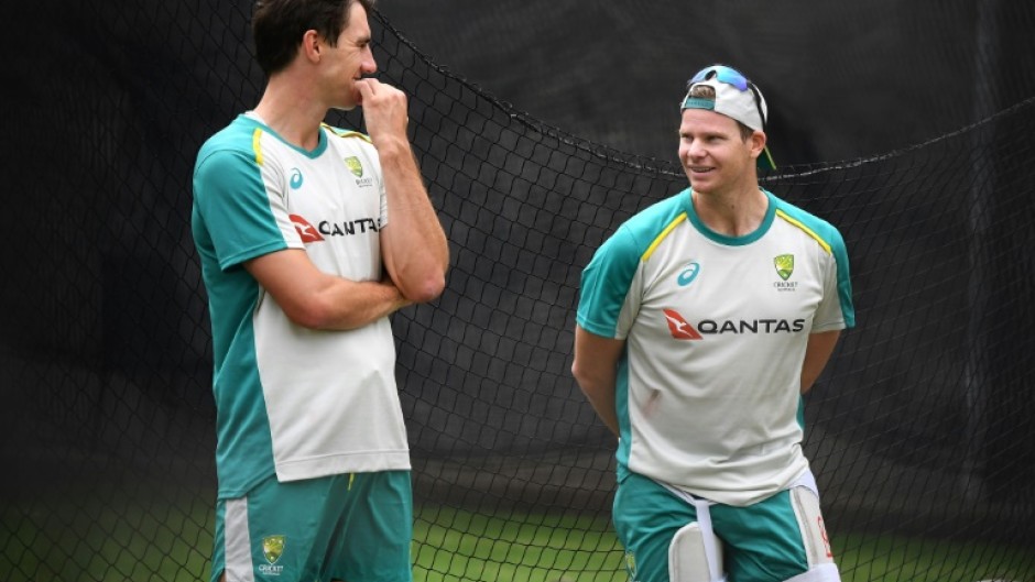 Pat Cummins (left) will miss the fourth Test against India with Steve Smith (right) acting as captain