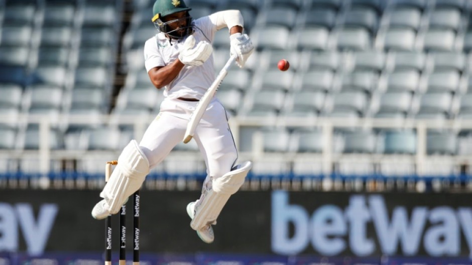 South Africa captain Temba Bavuma survived some testing moments but battled through to 171 not out 