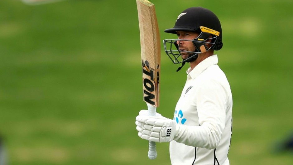 Devon Conway celebrates his half century for New Zealand against Sri Lanka at the start of the rain-affected second Test in Wellington on Friday