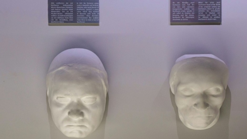 A life mask (L) and a death mask of German composer Ludwig Van Beethoven on display at the Funeral Museum in Vienna