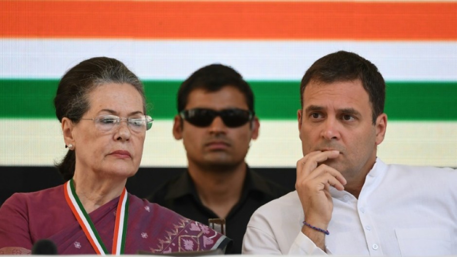 Rahul Gandhi (R) and his mother, the Indian National Congress party's former president, Sonia Gandhi (L), attend an event in New Delhi in 2019