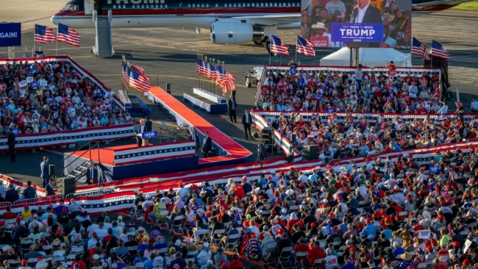 Former US president Donald Trump's plane served as part of the backdrop for his rally in Waco, Texas on March 25, 2023