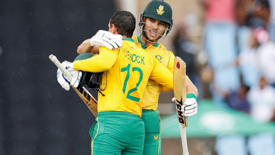 Record-breaking day: South Africa's Quinton de Kock (left) is congratulated by Reeza Hendricks 