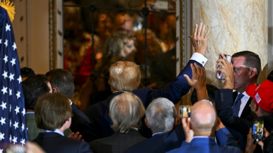 A photo shows former US President Donald Trump appearing before a New York judge to be arraigned on criminal charges