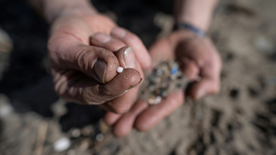 The size of a lentil, the tiny bits of plastic are used by industry to manufacture plastic products