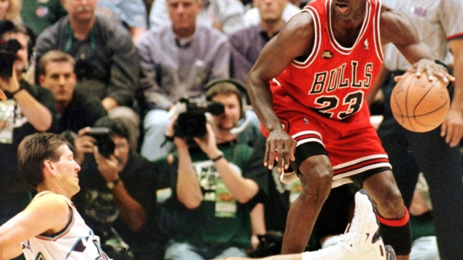 Michael Jordan in June 1998 in Salt Lake City, Utah, leaving a competitor helplessly looking on