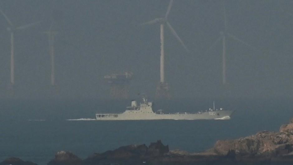 A Chinese navy ship seen off Pingtan island close to Taiwan on Monday. China's military said it had 'successfully completed' its drills around Taiwan